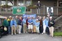 LOTS of Rotary members get ready to welcome the golfers.